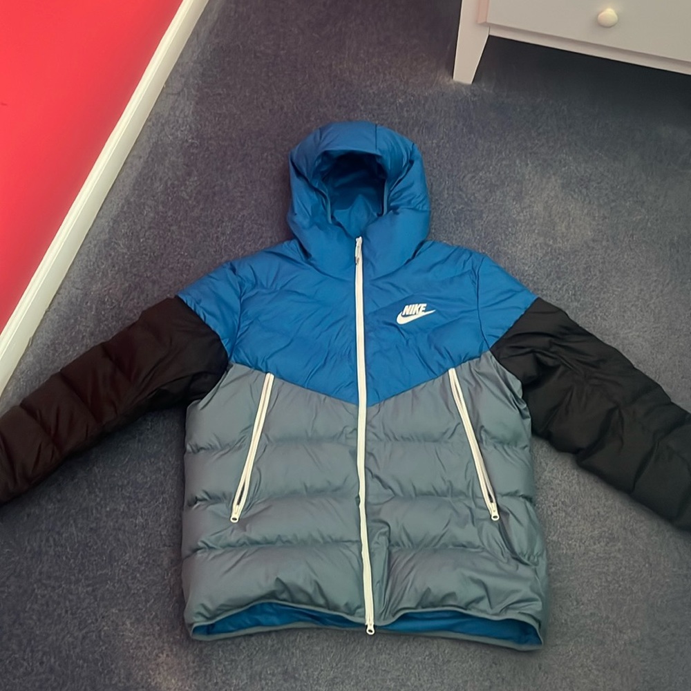 Nike blue puffer in great condition never worn just cleaning out the closet